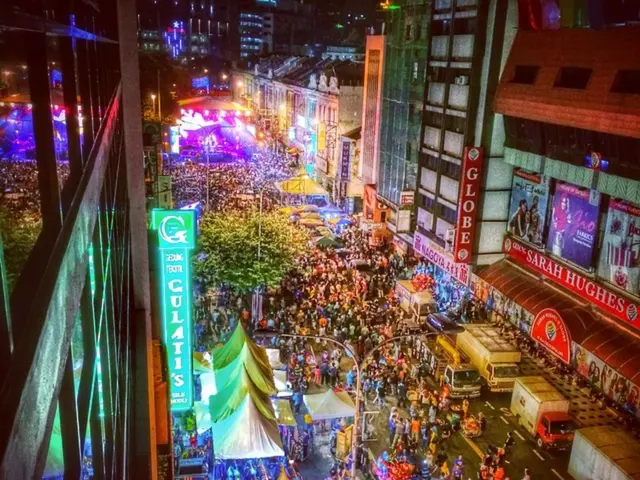 Multitudes thronging a sizzling street celebration in Zurich