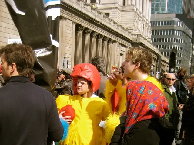 In this picture there is a clown in the center of the image and there are people on the right and...