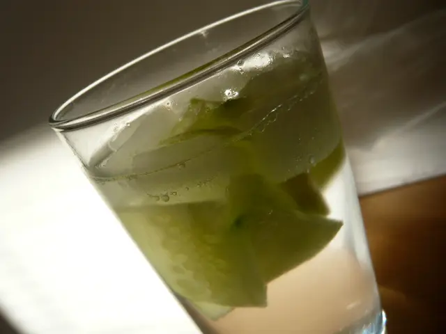 In this image I can see a glass contain a drink.